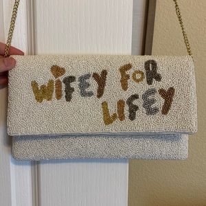 “Wifey for Lifey” bride purse.